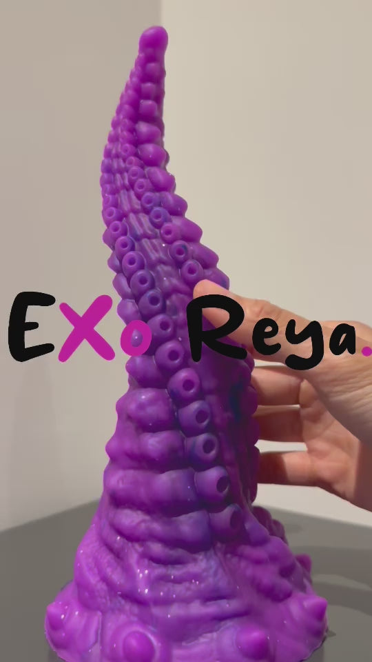 Purple twisted tentacle dildo with pointed tip and generous sea creature details by Exo Reya